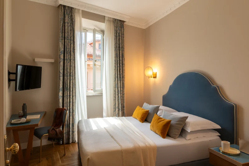 Elegant double room with blue headboard, natural light and contemporary comforts near Piazza di Spagna in Rome - Hotel City Palazzo dei Cardinali, BZAR hotels in Rome